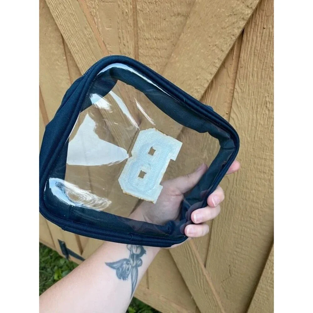 Initial makeup or toiletries bag